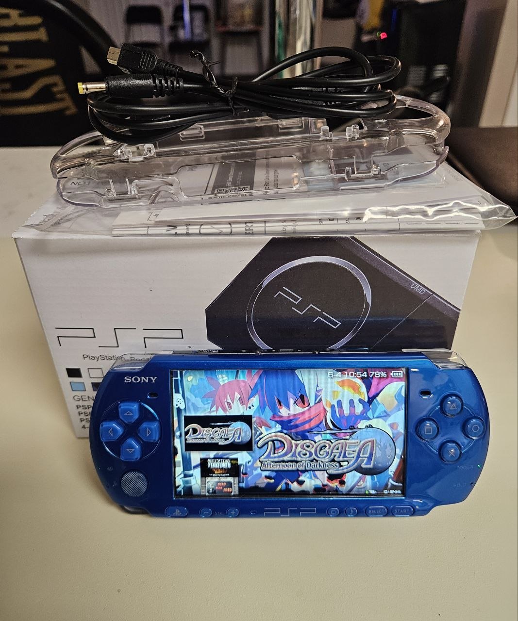 Cobalt Surge PSP-3000 powered on, vibrant blue finish